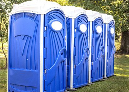 Four Blue Portable Toilet — Septic Tank Cleaning in Rockhampton, QLD